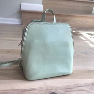 UO mint green convertible strap backpack